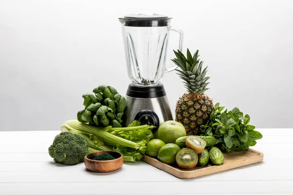 depositphotos_265442904-stock-photo-blender-green-fresh-vegetables-tasty
